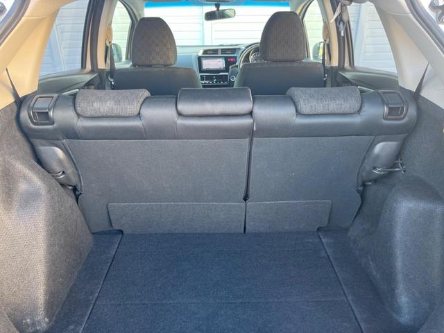 フィット １３Ｇ・Ｆパッケージ　禁煙車　純正ナビ　バックカメラ　アイドリングストップ　電動格納ミラー　スマートキー　ヘッドレベライザー　ステアリングリモコン　セキュリティアラーム（29枚目）