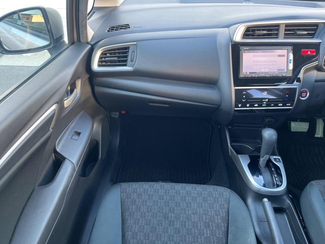 フィット １３Ｇ・Ｆパッケージ　禁煙車　純正ナビ　バックカメラ　アイドリングストップ　電動格納ミラー　スマートキー　ヘッドレベライザー　ステアリングリモコン　セキュリティアラーム（30枚目）