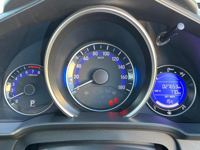 フィット １３Ｇ・Ｆパッケージ　禁煙車　純正ナビ　バックカメラ　アイドリングストップ　電動格納ミラー　スマートキー　ヘッドレベライザー　ステアリングリモコン　セキュリティアラーム（31枚目）