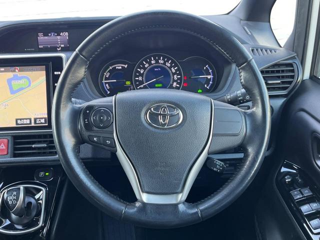 ノア ハイブリッドG 両側電動ドア 純正SDナビ 後席モニター バックカメラ 衝突被害軽減システム ドラレコ スマートキー LEDヘッド ビルトインETC クルコン オートハイビーム オートライト デュアルエアコン(12枚目)