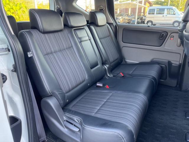 フリードハイブリッド ハイブリッド・Ｇホンダセンシング　後席モニター　バックカメラ　衝突被害軽減システム　レーダークルーズ　ハーフレザーシート　スマートキー　ＬＥＤヘッド　ビルトインＥＴＣ　オートライト　オートエアコン　ＣＤ　ＤＶＤ再生（9枚目）