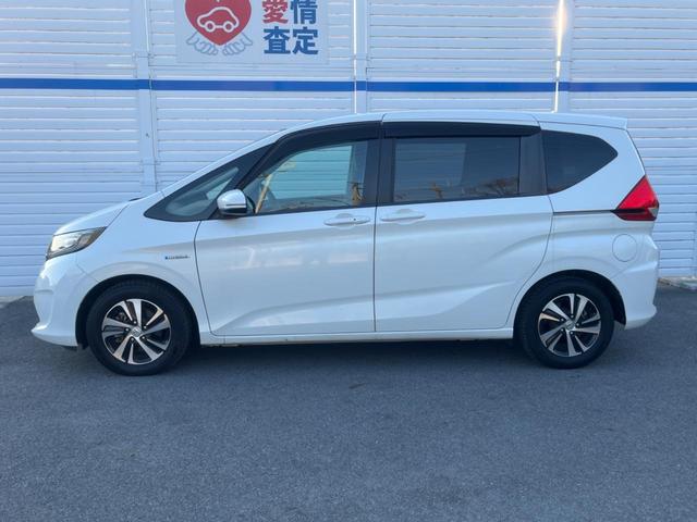 フリードハイブリッド ハイブリッド・Ｇホンダセンシング　後席モニター　バックカメラ　衝突被害軽減システム　レーダークルーズ　ハーフレザーシート　スマートキー　ＬＥＤヘッド　ビルトインＥＴＣ　オートライト　オートエアコン　ＣＤ　ＤＶＤ再生（26枚目）