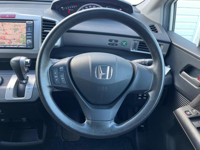 フリード G ジャストセレクション 両側電動ドア 純正HDDナビ バックカメラ スマートキー HIDヘッド ビルトインETC オートライト オートエアコン CD DVD再生 地デジ(11枚目)