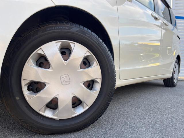 フリード G ジャストセレクション 両側電動ドア 純正HDDナビ バックカメラ スマートキー HIDヘッド ビルトインETC オートライト オートエアコン CD DVD再生 地デジ(12枚目)