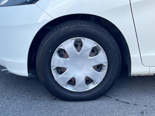 フリード G ジャストセレクション 両側電動ドア 純正HDDナビ バックカメラ スマートキー HIDヘッド ビルトインETC オートライト オートエアコン CD DVD再生 地デジ(25枚目)