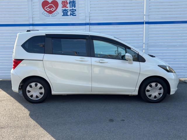 フリード G ジャストセレクション 両側電動ドア 純正HDDナビ バックカメラ スマートキー HIDヘッド ビルトインETC オートライト オートエアコン CD DVD再生 地デジ(34枚目)