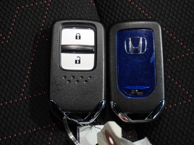 フィットハイブリッド Ｓパッケージ　７インチ純正メモリーナビ　クルーズコントロール　ＬＥＤヘッドライト　ＥＴＣ　ドライブレコーダー　リアカメラ　ＣＤ　ＤＶＤ　Ｂｌｕｅｔｏｏｔｈ　スマートキー　電動格納ミラー　カーテンエアバック（48枚目）