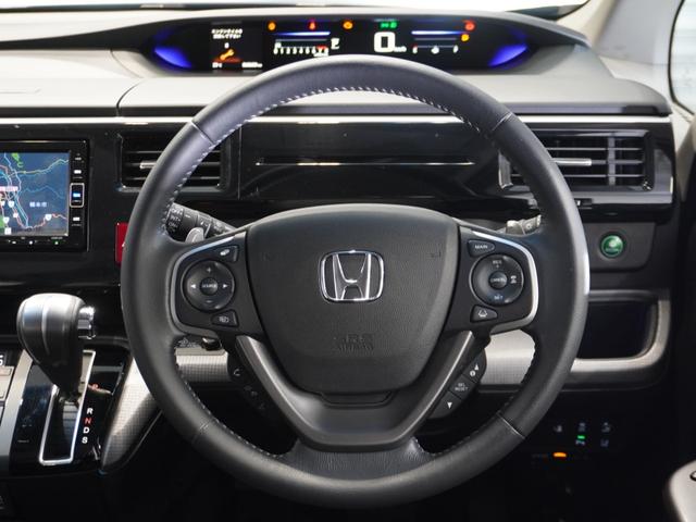 ステップワゴンスパーダ スパーダホンダセンシング　７インチ純正メモリーナビ　ホンダセンシング　ＬＥＤヘッドライト　ＥＴＣ　クルーズコントロール　ＣＤ　ＤＶＤ　フルセグ　ミュージックラック　Ｂｌｕｅｔｏｏｔｈ　バックカメラ　前後センサー（35枚目）