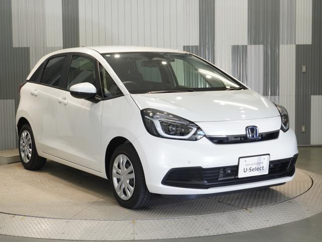 フィット ｅ：ＨＥＶホーム　当社デモカー　純正メモリーナビ　ホンダセンシング　ＬＥＤヘッドライト　オートハイビーム　ＥＴＣ　ドライブレコーダー　ＵＳＢ　スマートキー　両席エアバック　カーテンエアバック　サイドエアバッグ（7枚目）