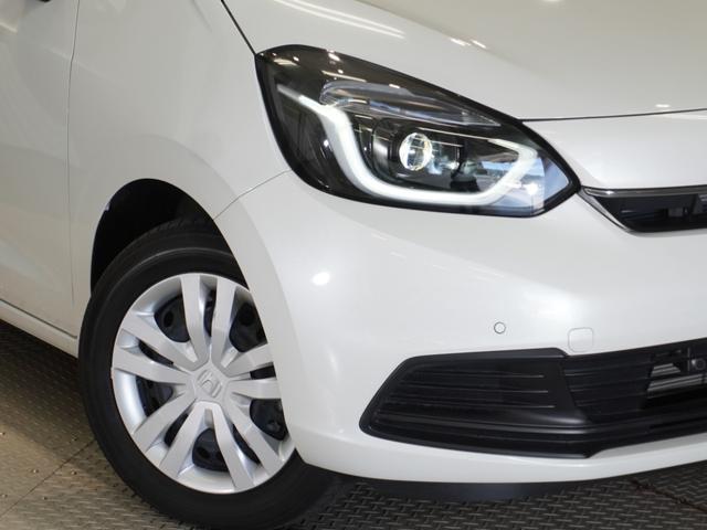 フィット ｅ：ＨＥＶホーム　当社デモカー　純正メモリーナビ　ホンダセンシング　ＬＥＤヘッドライト　オートハイビーム　ＥＴＣ　ドライブレコーダー　ＵＳＢ　スマートキー　両席エアバック　カーテンエアバック　サイドエアバッグ（31枚目）