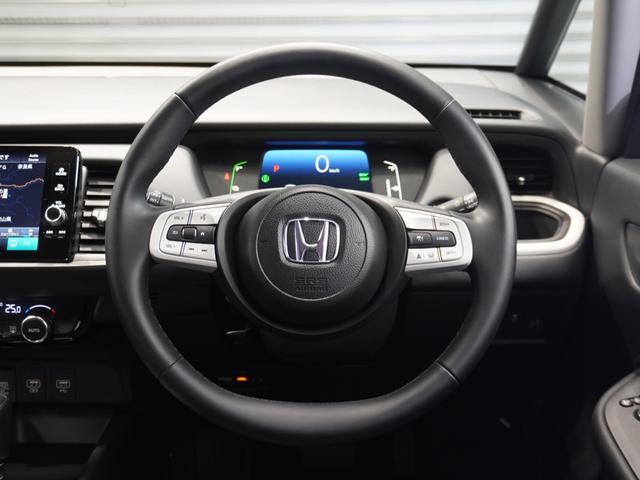 フィット ｅ：ＨＥＶホーム　当社デモカー　純正メモリーナビ　ホンダセンシング　ＬＥＤヘッドライト　オートハイビーム　ＥＴＣ　ドライブレコーダー　ＵＳＢ　スマートキー　両席エアバック　カーテンエアバック　サイドエアバッグ（33枚目）