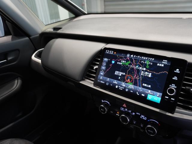 フィット ｅ：ＨＥＶホーム　当社デモカー　純正メモリーナビ　ホンダセンシング　ＬＥＤヘッドライト　オートハイビーム　ＥＴＣ　ドライブレコーダー　ＵＳＢ　スマートキー　両席エアバック　カーテンエアバック　サイドエアバッグ（36枚目）