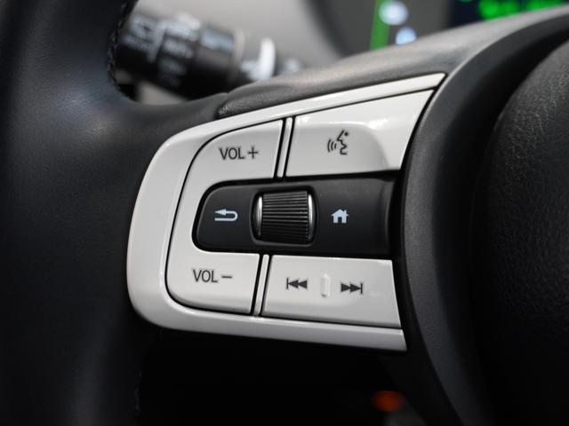 フィット ｅ：ＨＥＶホーム　当社デモカー　純正メモリーナビ　ホンダセンシング　ＬＥＤヘッドライト　オートハイビーム　ＥＴＣ　ドライブレコーダー　ＵＳＢ　スマートキー　両席エアバック　カーテンエアバック　サイドエアバッグ（52枚目）