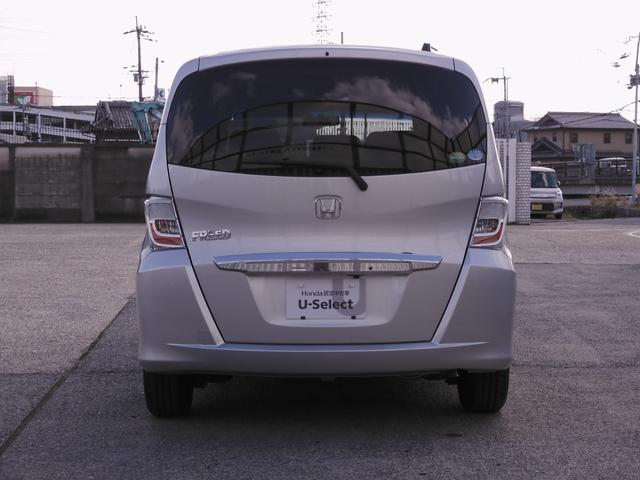 フリード Ｇジャストセレクション　ワンオーナー　７インチナビ　バックカメラ　片側電動スライドドア　オートエアコン　パワーステアリング　パワーウィンドウ　横滑り防止装置　盗難防止装置　ワンセグ　３列シート　スマートキー　禁煙車（14枚目）