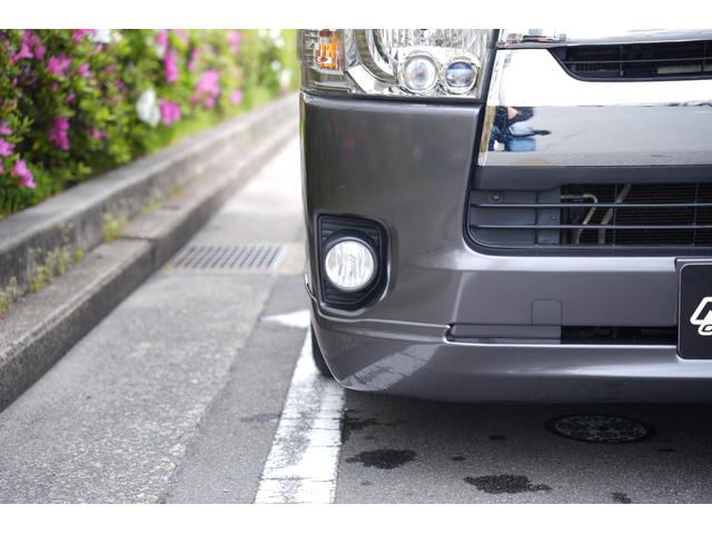 ハイエースバン スーパーGL ダークプライム 車中泊ベットキット デビルボンネット 415COBRAフロントリップ 2.5インチAWタイヤ スムージングバンパー ETC トヨタ純正ナビ リアウイング スタイリッシュテール(9枚目)
