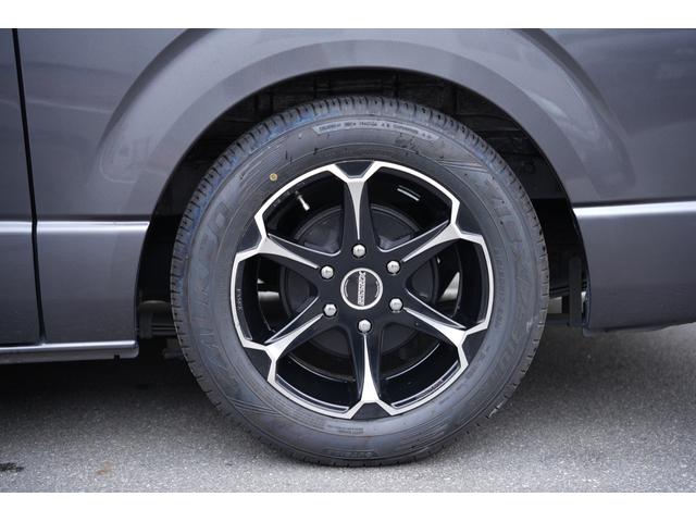 ハイエースバン スーパーGL ダークプライム 車中泊ベットキット デビルボンネット 415COBRAフロントリップ 2.5インチAWタイヤ スムージングバンパー ETC トヨタ純正ナビ リアウイング スタイリッシュテール(24枚目)
