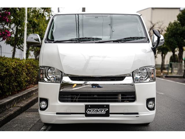 ハイエースバン ロングスーパーGL 跳ね上げ式ベッドキット バッドフェイス 415COBRAフロントスポイラー スムージングバンパー スモークテール ピアノブラックインテリアセット(6枚目)