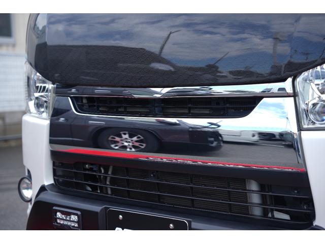 ハイエースバン ロングスーパーＧＬ　ＴＲＤ仕様　両側電動パワースライドドア　カーボンボンネット　プッシュスタート　トヨタ純正ナビ　Ｂｕｔｔｌｅｒシートカバー　木目調インテリア　ＥＴＣ（12枚目）