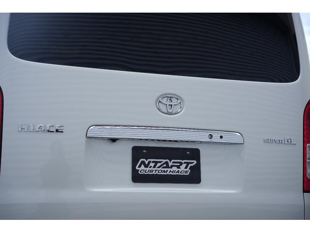 ハイエースバン ロングスーパーＧＬ　ＴＲＤ仕様　両側電動パワースライドドア　カーボンボンネット　プッシュスタート　トヨタ純正ナビ　Ｂｕｔｔｌｅｒシートカバー　木目調インテリア　ＥＴＣ（17枚目）