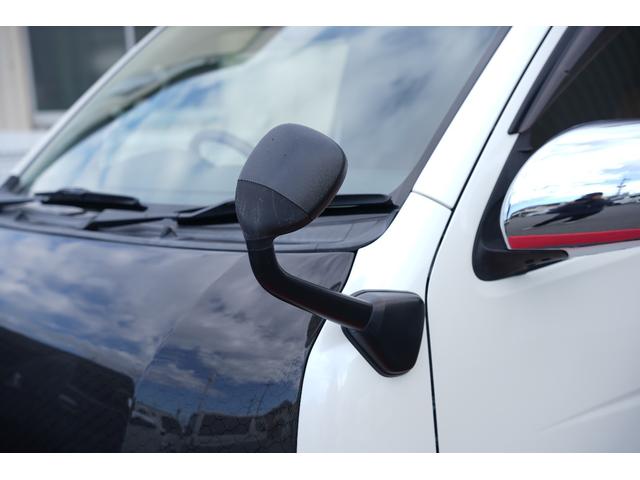 ハイエースバン ロングスーパーＧＬ　ＴＲＤ仕様　両側電動パワースライドドア　カーボンボンネット　プッシュスタート　トヨタ純正ナビ　Ｂｕｔｔｌｅｒシートカバー　木目調インテリア　ＥＴＣ（19枚目）