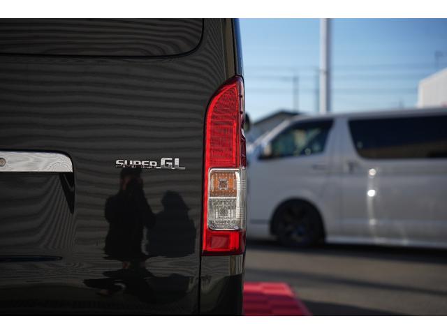 ハイエースバン ロングスーパーGL 車中泊ベッドキット バッドフェイス 415COBRAフロントスポイラー BIGX ETC Buttlerシートカバー(16枚目)