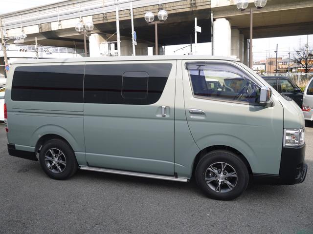 ハイエースバン ロングスーパーGL アースカラーパッケージ アルパイン11型ナビ・12.8型フリップダウンモニター・ルーフスピーカー×4 GRフロントスポイラー・サイドスカート 20周年スカッフプレート 両側電動スライド・小窓ガラス交換(68枚目)