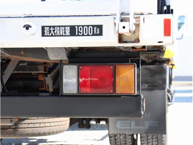 エルフトラック Wキャブロングフルフラットローダンプ 積載車 ETC 6MT ラジコン付ユニック エアコン ラジオ エアバッグ 電動格納ミラー パワーウィンドウ フルフラットロー(21枚目)