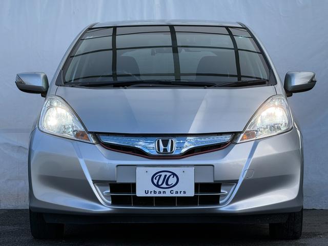 フィットハイブリッド ナビプレミアムセレクション　弊社買取車両　故障診断済　純正ＨＤＤナビ／ワンセグ／ＤＶＤ再生／録音／ＵＳＢ　Ｂカメラ　ビルトインＥＴＣ　前後ドラレコ　パドルシフト　前席シートヒーター　クルコン　ＨＩＤヘッドライト　雹害車（18枚目）