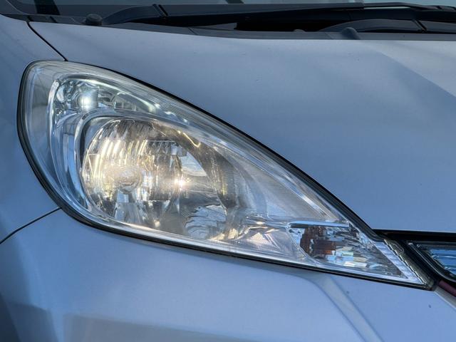 フィットハイブリッド ナビプレミアムセレクション　弊社買取車両　故障診断済　純正ＨＤＤナビ／ワンセグ／ＤＶＤ再生／録音／ＵＳＢ　Ｂカメラ　ビルトインＥＴＣ　前後ドラレコ　パドルシフト　前席シートヒーター　クルコン　ＨＩＤヘッドライト　雹害車（21枚目）