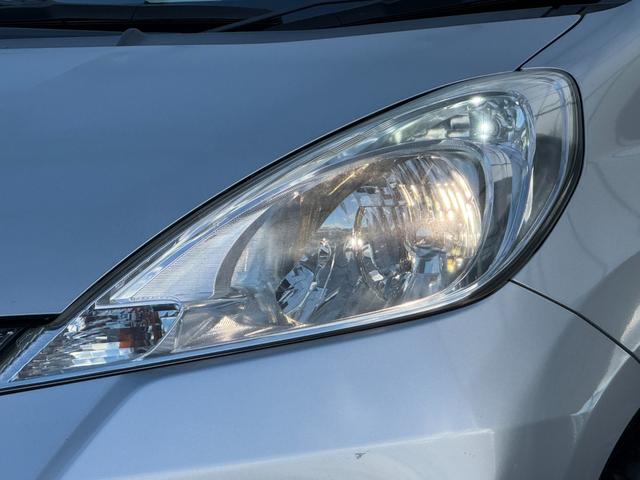 フィットハイブリッド ナビプレミアムセレクション　弊社買取車両　故障診断済　純正ＨＤＤナビ／ワンセグ／ＤＶＤ再生／録音／ＵＳＢ　Ｂカメラ　ビルトインＥＴＣ　前後ドラレコ　パドルシフト　前席シートヒーター　クルコン　ＨＩＤヘッドライト　雹害車（22枚目）