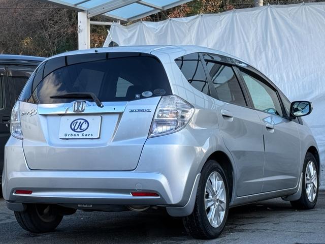 フィットハイブリッド ナビプレミアムセレクション　弊社買取車両　故障診断済　純正ＨＤＤナビ／ワンセグ／ＤＶＤ再生／録音／ＵＳＢ　Ｂカメラ　ビルトインＥＴＣ　前後ドラレコ　パドルシフト　前席シートヒーター　クルコン　ＨＩＤヘッドライト　雹害車（31枚目）