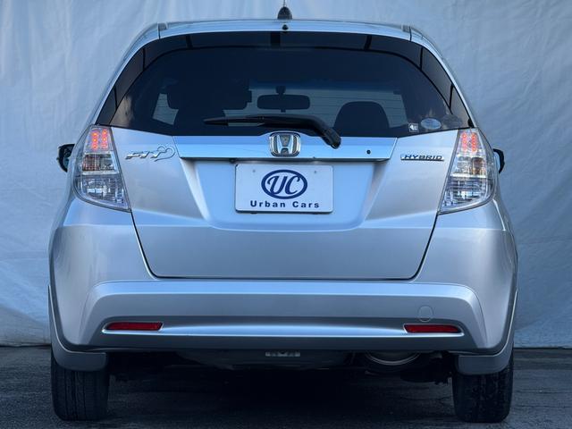 フィットハイブリッド ナビプレミアムセレクション　弊社買取車両　故障診断済　純正ＨＤＤナビ／ワンセグ／ＤＶＤ再生／録音／ＵＳＢ　Ｂカメラ　ビルトインＥＴＣ　前後ドラレコ　パドルシフト　前席シートヒーター　クルコン　ＨＩＤヘッドライト　雹害車（34枚目）