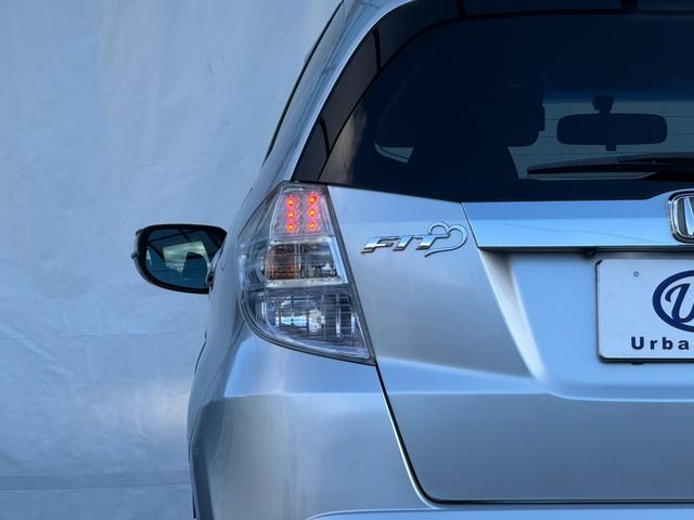 フィットハイブリッド ナビプレミアムセレクション　弊社買取車両　故障診断済　純正ＨＤＤナビ／ワンセグ／ＤＶＤ再生／録音／ＵＳＢ　Ｂカメラ　ビルトインＥＴＣ　前後ドラレコ　パドルシフト　前席シートヒーター　クルコン　ＨＩＤヘッドライト　雹害車（35枚目）