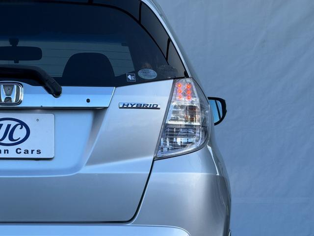 フィットハイブリッド ナビプレミアムセレクション　弊社買取車両　故障診断済　純正ＨＤＤナビ／ワンセグ／ＤＶＤ再生／録音／ＵＳＢ　Ｂカメラ　ビルトインＥＴＣ　前後ドラレコ　パドルシフト　前席シートヒーター　クルコン　ＨＩＤヘッドライト　雹害車（36枚目）