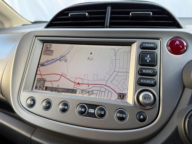 フィットハイブリッド ナビプレミアムセレクション　弊社買取車両　故障診断済　純正ＨＤＤナビ／ワンセグ／ＤＶＤ再生／録音／ＵＳＢ　Ｂカメラ　ビルトインＥＴＣ　前後ドラレコ　パドルシフト　前席シートヒーター　クルコン　ＨＩＤヘッドライト　雹害車（62枚目）