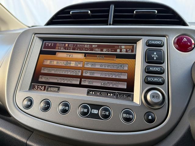 フィットハイブリッド ナビプレミアムセレクション　弊社買取車両　故障診断済　純正ＨＤＤナビ／ワンセグ／ＤＶＤ再生／録音／ＵＳＢ　Ｂカメラ　ビルトインＥＴＣ　前後ドラレコ　パドルシフト　前席シートヒーター　クルコン　ＨＩＤヘッドライト　雹害車（63枚目）