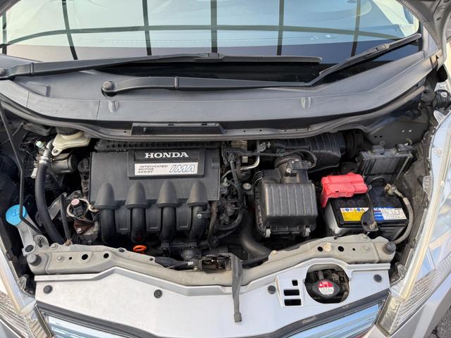 フィットハイブリッド ナビプレミアムセレクション　弊社買取車両　故障診断済　純正ＨＤＤナビ／ワンセグ／ＤＶＤ再生／録音／ＵＳＢ　Ｂカメラ　ビルトインＥＴＣ　前後ドラレコ　パドルシフト　前席シートヒーター　クルコン　ＨＩＤヘッドライト　雹害車（79枚目）