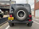 ジープ・ラングラー サハラ 当社ユーザー様買取車 社外オーバーフェンダー 社外アルミタイヤ 車検対応 中古車画像_4