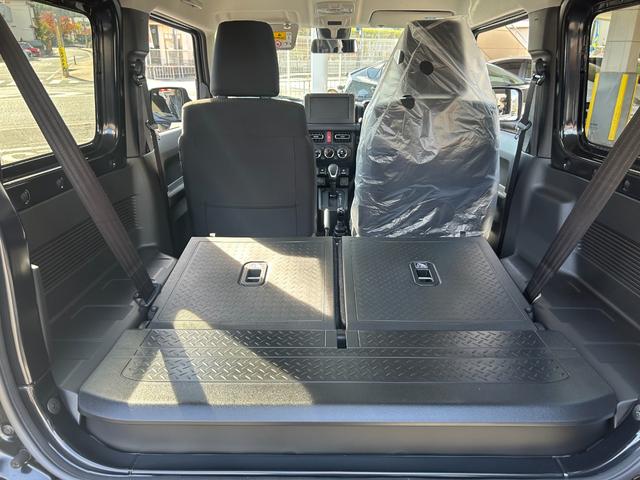 ジムニー ＸＣ　スズキセーフティサポート　クルーズコントロール　衝突被害軽減ブレーキ　ＬＥＤヘッドライト　プッシュボタンスタート　アイドリングストップ　純正アルミホイール　シートヒーター　電動格ドアミラー（53枚目）