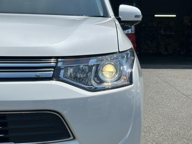 アウトランダーＰＨＥＶ Ｇプレミアムパッケージ　純正メモリーナビ　Ｂカメラ　ロックフォード　黒革パワーシート　ドラレコ　衝突被害軽減Ｂ　レーダークルーズ　ＬＫＡ　シートヒーター　ＥＴＣ　ＬＥＤヘッドライト　純正１８インチＡＷ　１５００Ｗ電源（15枚目）