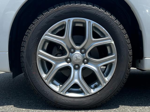 アウトランダーＰＨＥＶ Ｇプレミアムパッケージ　純正メモリーナビ　Ｂカメラ　ロックフォード　黒革パワーシート　ドラレコ　衝突被害軽減Ｂ　レーダークルーズ　ＬＫＡ　シートヒーター　ＥＴＣ　ＬＥＤヘッドライト　純正１８インチＡＷ　１５００Ｗ電源（22枚目）
