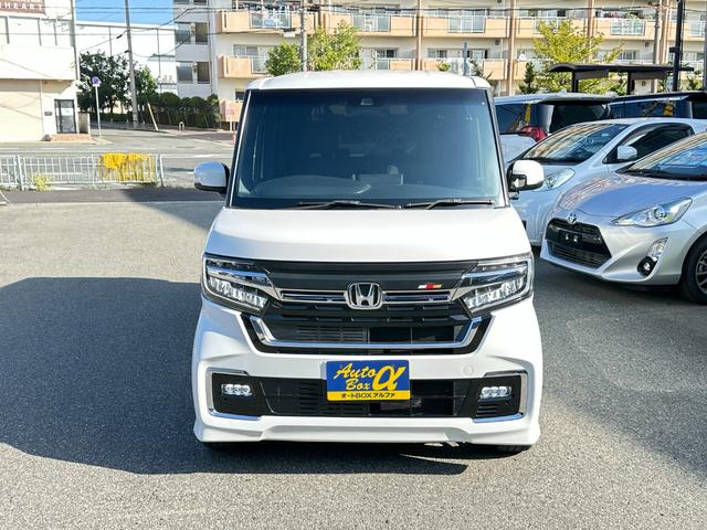 Ｎ－ＢＯＸカスタム Ｌターボ　ホンダセンシング　社外メモリーナビ・フルセグＴＶ　バックカメラ　両側パワースライド　ハーフレザーシート　ＬＥＤヘッドライト・ＬＥＤフォグ　ＬＫＡ・ＴＲＣ・ＥＴＣ　無限フロントグリル　ライトレベライザー（7枚目）