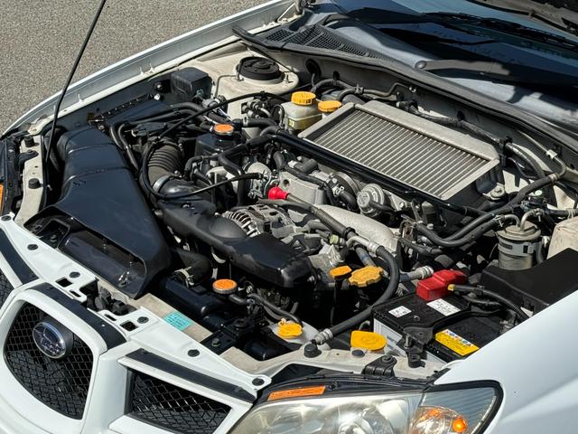 インプレッサ ＷＲＸ　／５ＭＴ／ＥＪ２０／ターボ／ストラーダナビ／ミュージックサーバー／ＤＶＤ再生／ディスチャージ／キーレス／オートＡＣ／革巻ステアリング（37枚目）