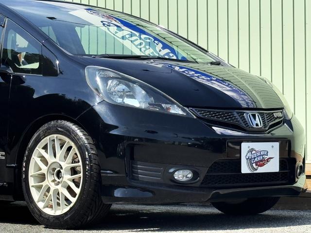 フィット RS /後期/6MT/APEXIマフラー/16AW/ローダウン/無限ステアリング/カーボン調シート/リアスポイラー/TV/Bluetooth/CD/AUX/オートライト/オートAC/ETC/キーレスエントリ(18枚目)