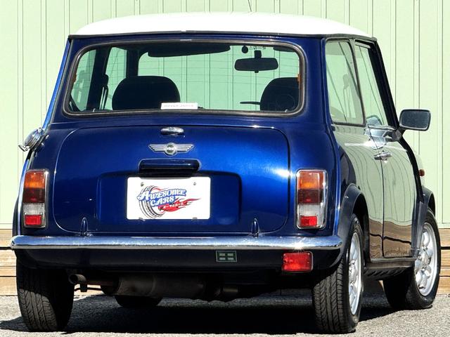 MINI クーパー /禁煙車/革シート/エアコン動作確認/天張り垂れ無し/ETC/12インチクーパーホイール/革巻きステアリング/ウッド調パネル/(2枚目)