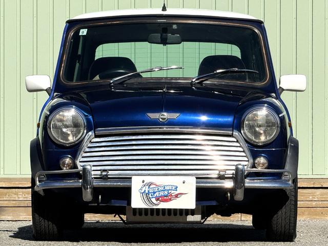 MINI クーパー /禁煙車/革シート/エアコン動作確認/天張り垂れ無し/ETC/12インチクーパーホイール/革巻きステアリング/ウッド調パネル/(7枚目)