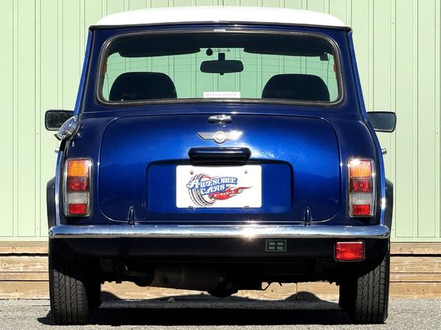 MINI クーパー /禁煙車/革シート/エアコン動作確認/天張り垂れ無し/ETC/12インチクーパーホイール/革巻きステアリング/ウッド調パネル/(8枚目)