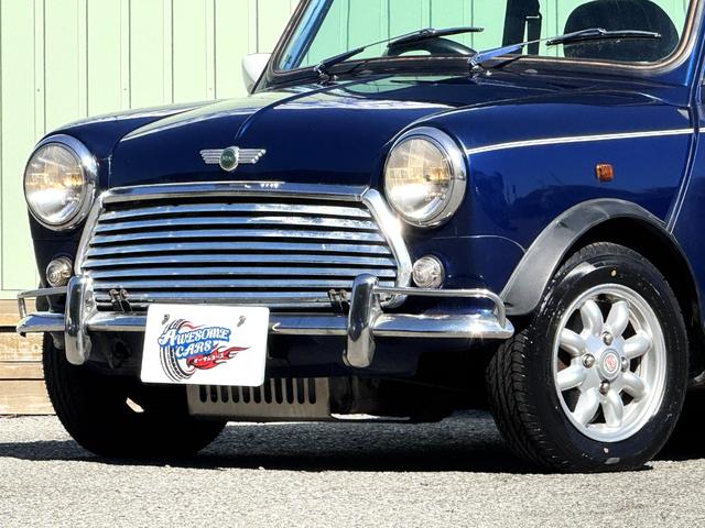MINI クーパー /禁煙車/革シート/エアコン動作確認/天張り垂れ無し/ETC/12インチクーパーホイール/革巻きステアリング/ウッド調パネル/(10枚目)