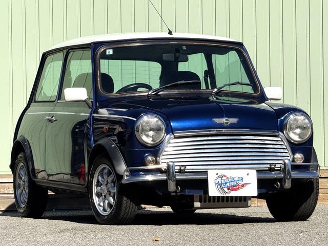 MINI クーパー /禁煙車/革シート/エアコン動作確認/天張り垂れ無し/ETC/12インチクーパーホイール/革巻きステアリング/ウッド調パネル/(12枚目)