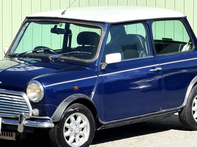 MINI クーパー /禁煙車/革シート/エアコン動作確認/天張り垂れ無し/ETC/12インチクーパーホイール/革巻きステアリング/ウッド調パネル/(15枚目)